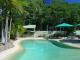 Heated and cooled lagoon style pool - The Retreat Beach Houses