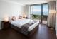 Ocean View Suite Bedroom
 - Cairns Plaza Hotel