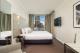 One Bedroom River View Suite - Bedroom - Clarion Suites Gateway