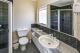 2 bedroom ocean view bathroom
 - On the Beach Holiday Apartments