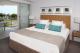 2 & 3 Bedroom Deluxe Master bedroom
 - Vision Apartments Esplanade Cairns