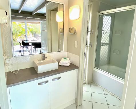 Bathroom and Vanity
- Kellys Beach Resort