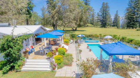 a bird's eye view of the villa and pool - Sunset Villa