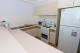 1 Bedroom Ocean & 1 Bedroom Apartment Kitchen - Beachcomber Surfers Paradise