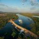 Flying over Lake Kununurra Diversion Dam
 - Croc Spotting Helicopter Flight- KH30C HeliSpirit