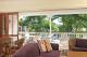Living area and Balcony
 - Mantra On The Inlet Port Douglas